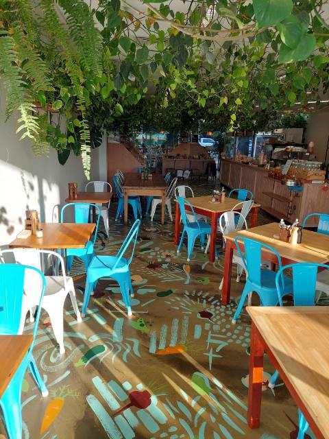 The purpose of the picture is to show the seating & decoration at the charming Giles St Kitchen Catering & Cafe